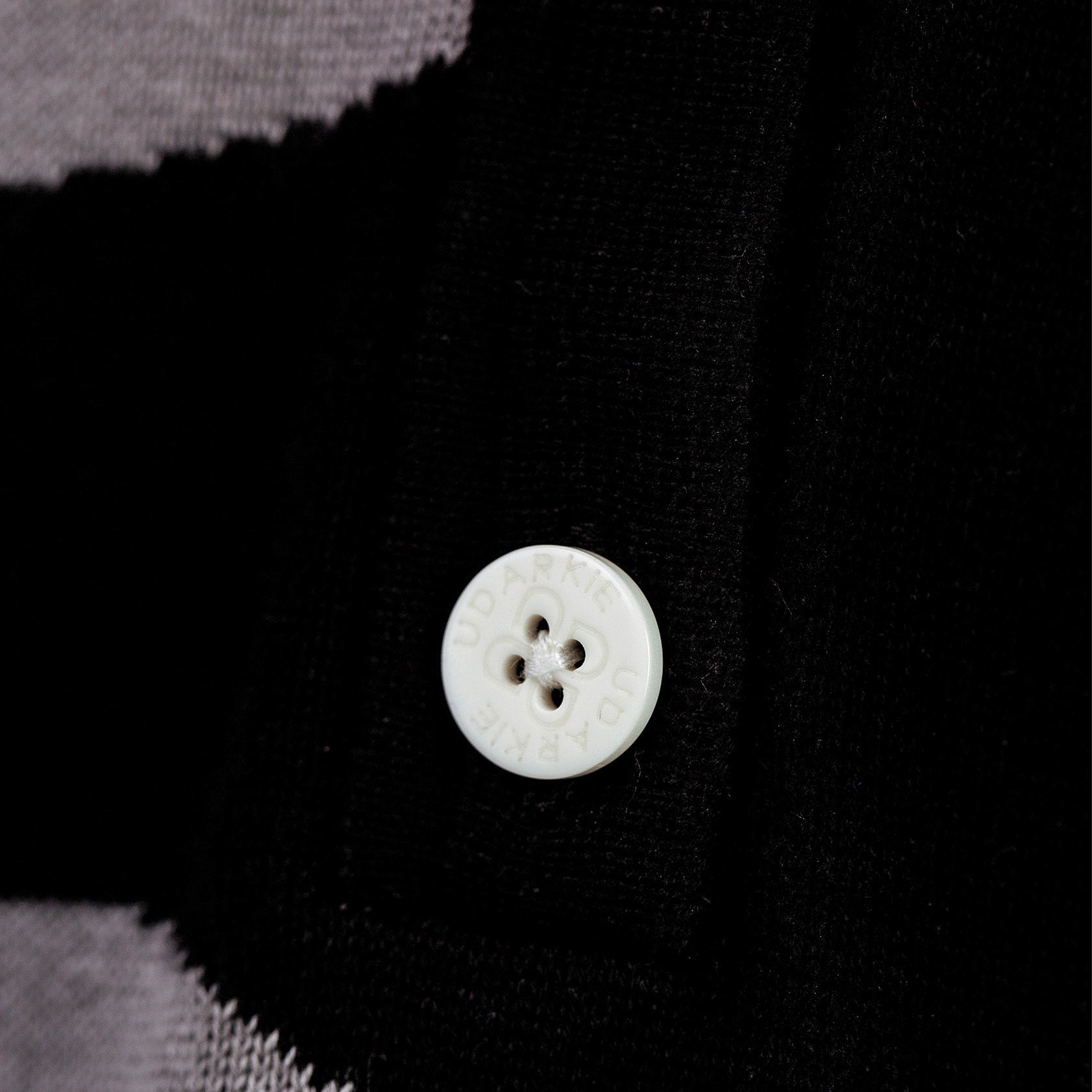 white knitted two-piece button