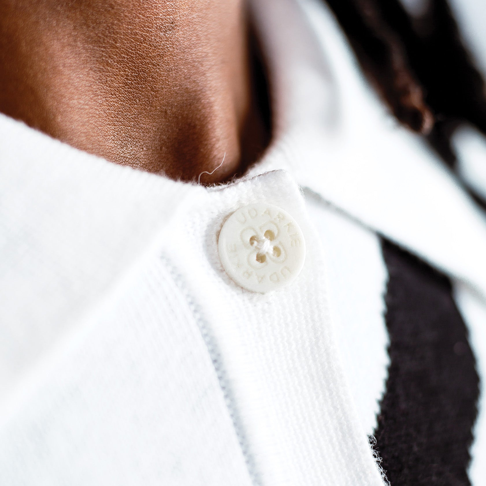 white knitted two-piece button