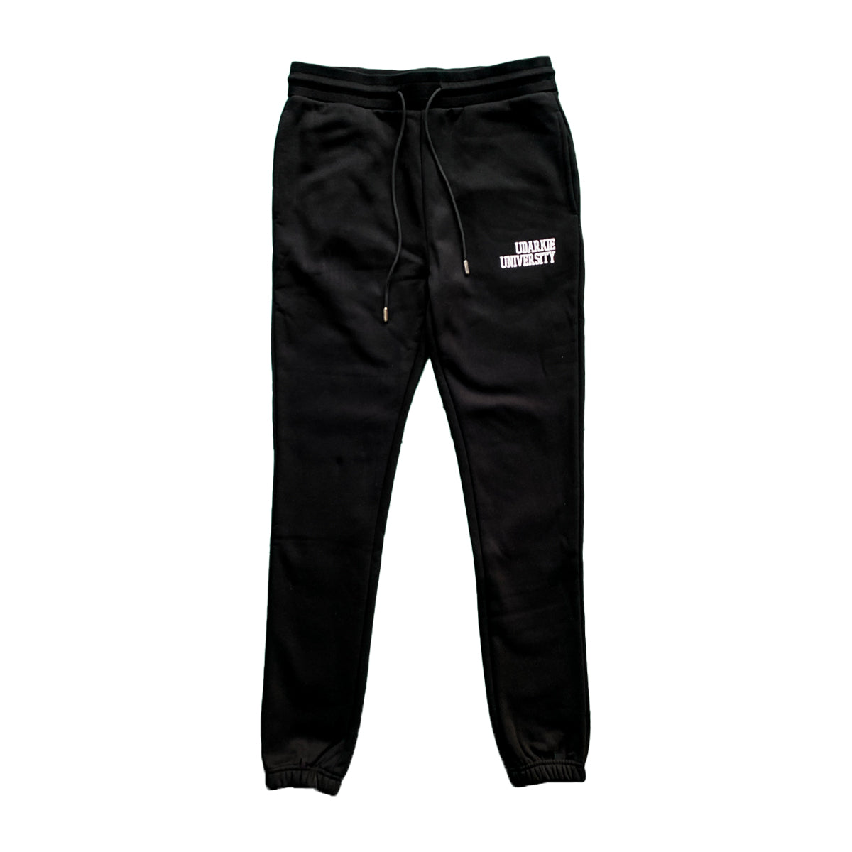 Black sweatpants with white "UDARKIE UNIVERSITY" silicone print on the thigh, featuring drawstring waistband and elastic cuffs.