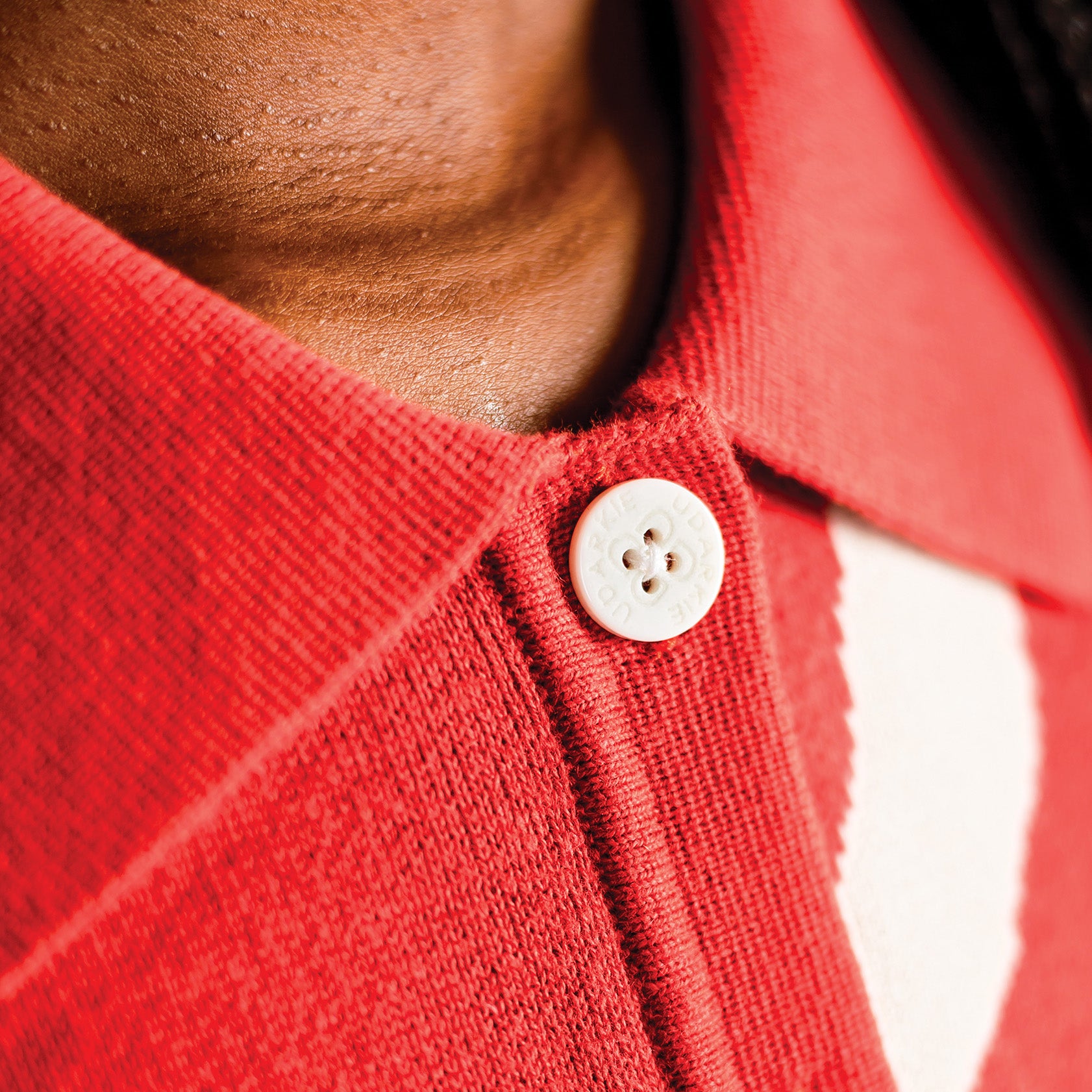 Orange knitted two piece white button