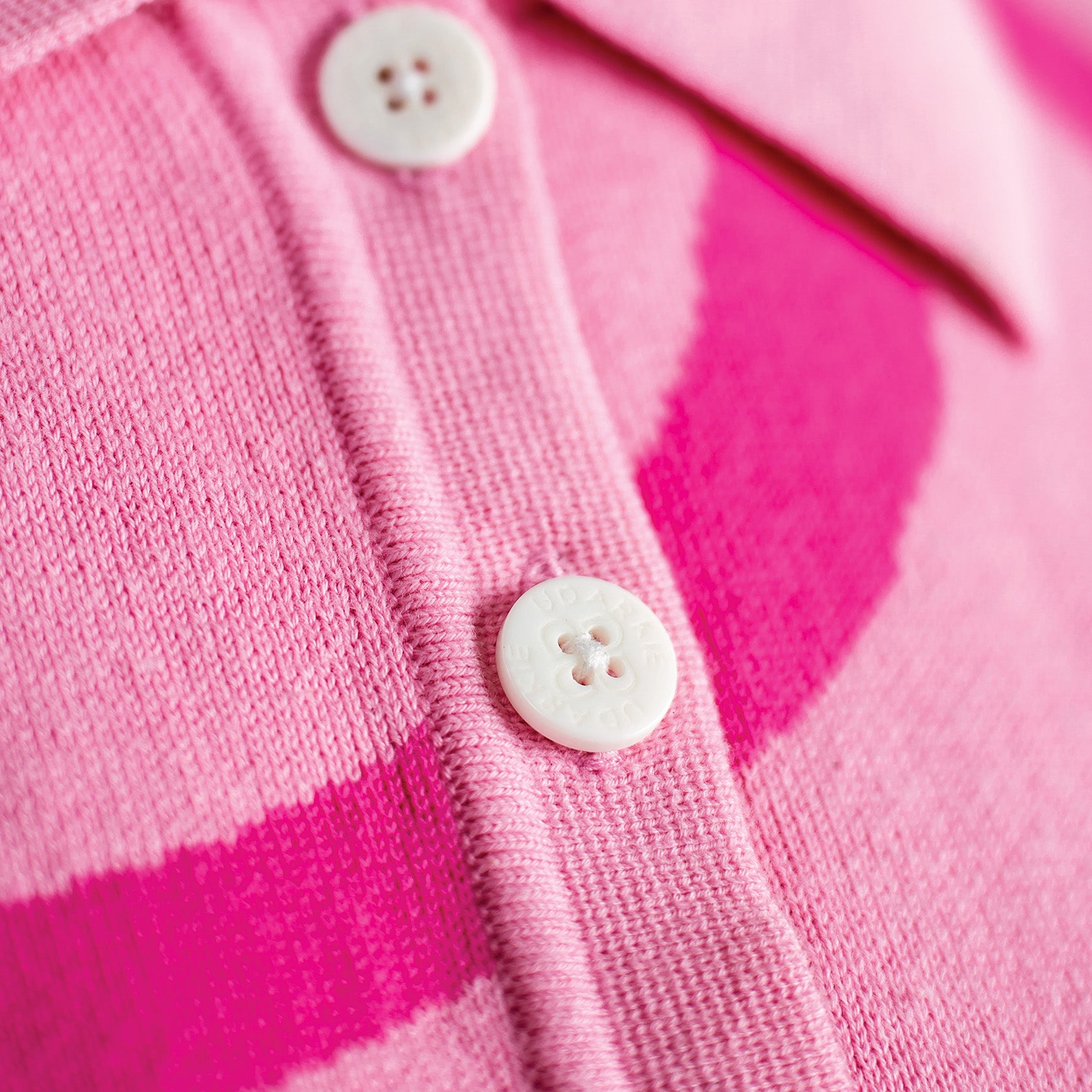 Pink two piece white button