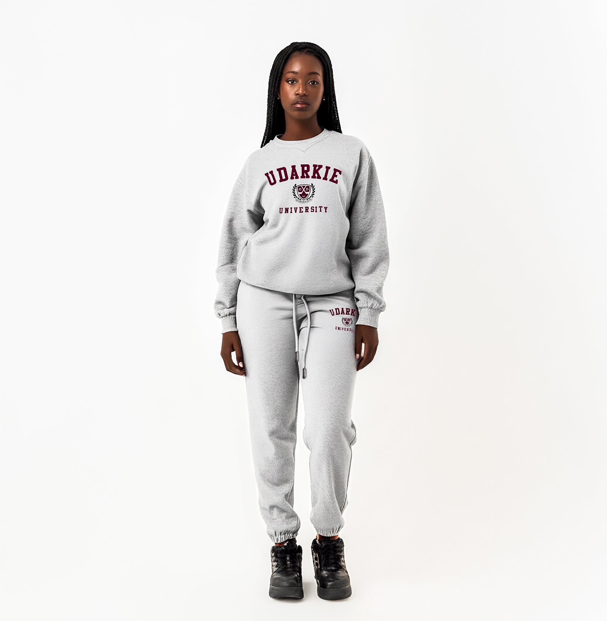 Front view of gray UDARKIE UNIVERSITY sweatsuit with a maroon text and logo on both sweatshirt and sweatpants