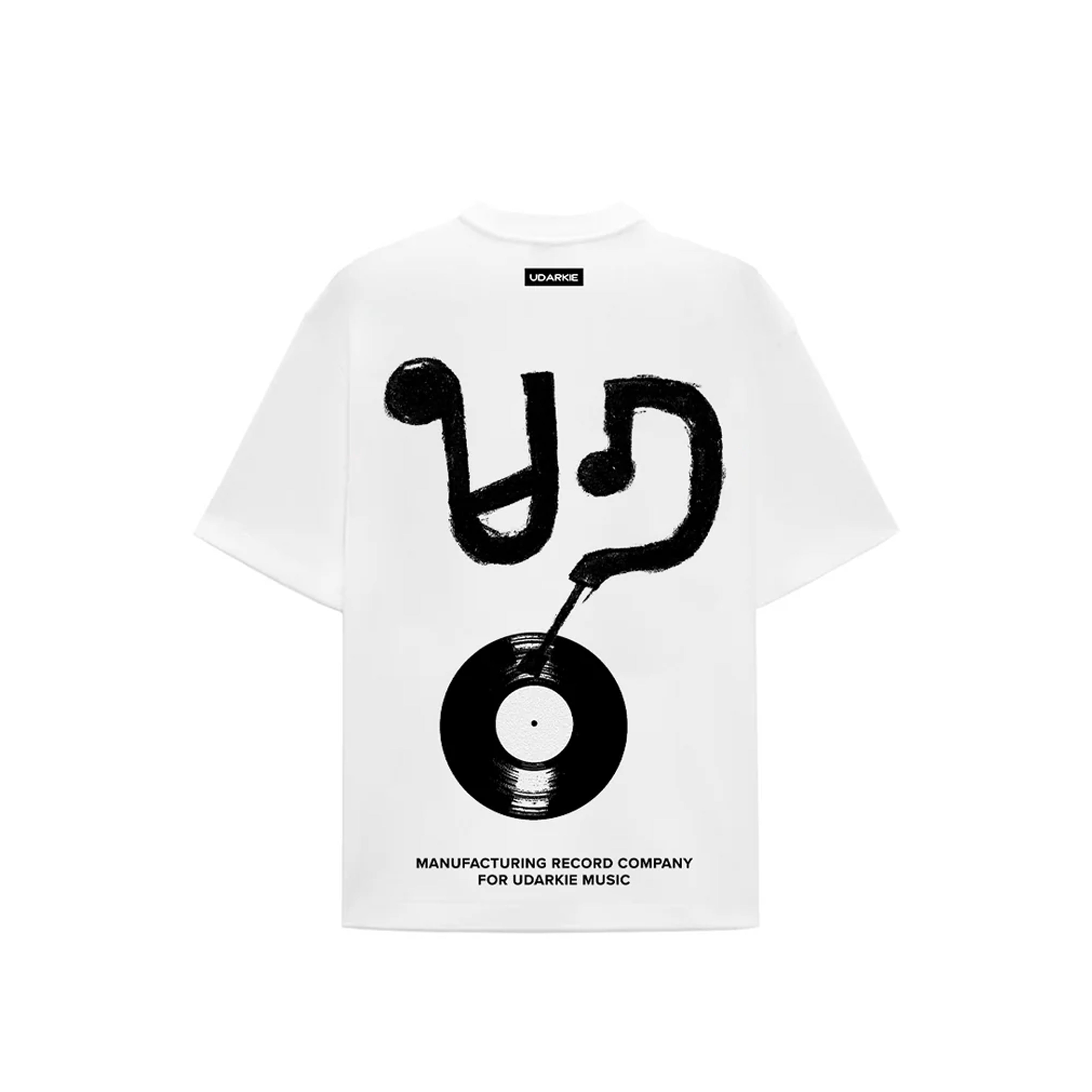 Back view of a white T-shirt featuring a black vinyl record graphic with stylized "U" and "D" shapes, and text reading "MANUFACTURING RECORD COMPANY FOR UDARKIE MUSIC".