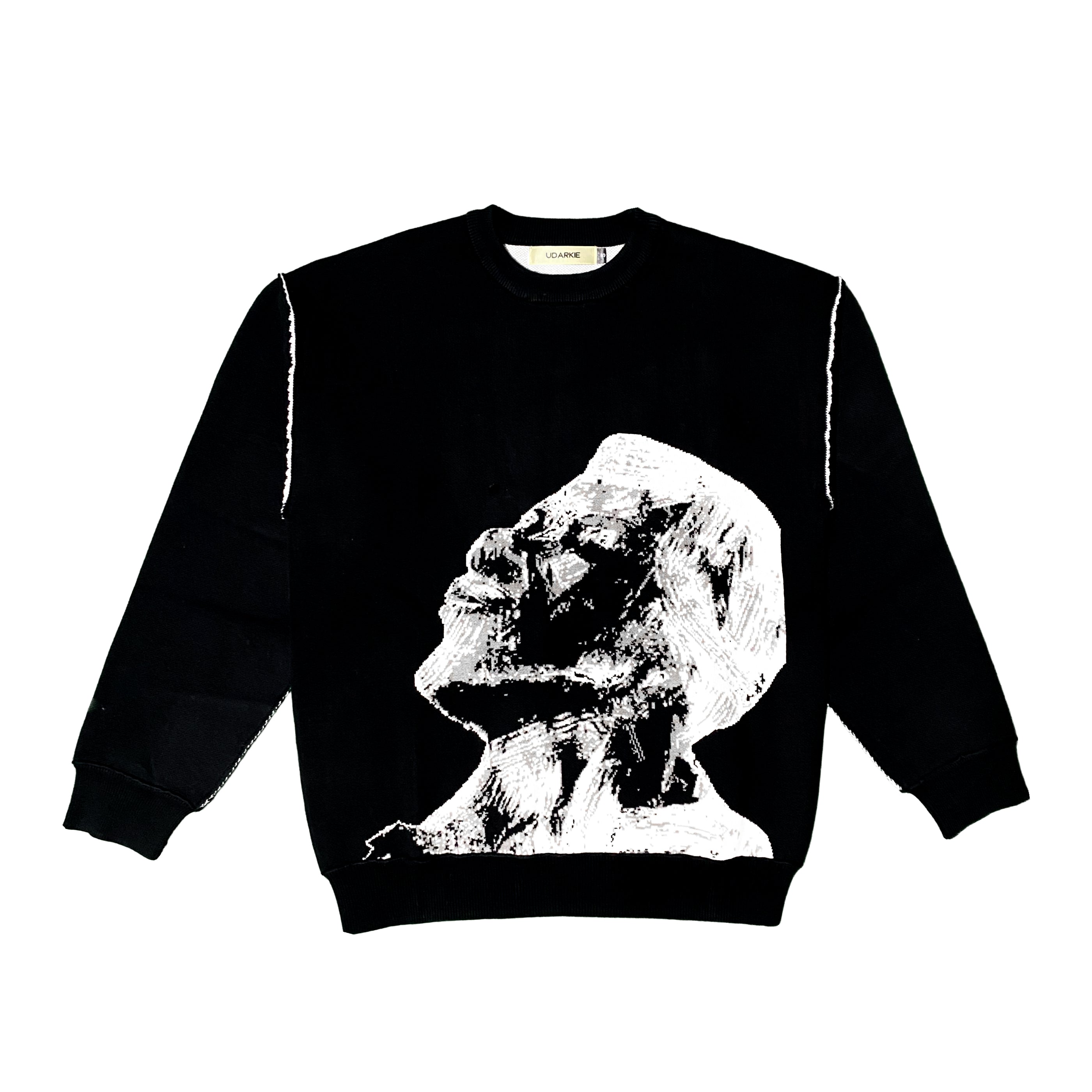 Black sweatshirt featuring a white graphic print of an elderly person's side profile looking upwards. High-contrast design with artistic detail.